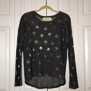 dark grey sweater with shiny stars